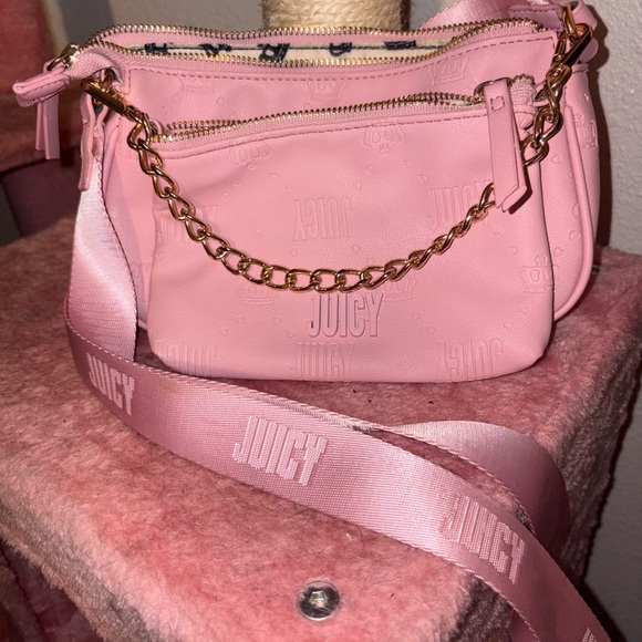 Juicy Couture Handbags - Juicy Couture Pink Crossbody Bag with Chain Detail. Like new, never used.